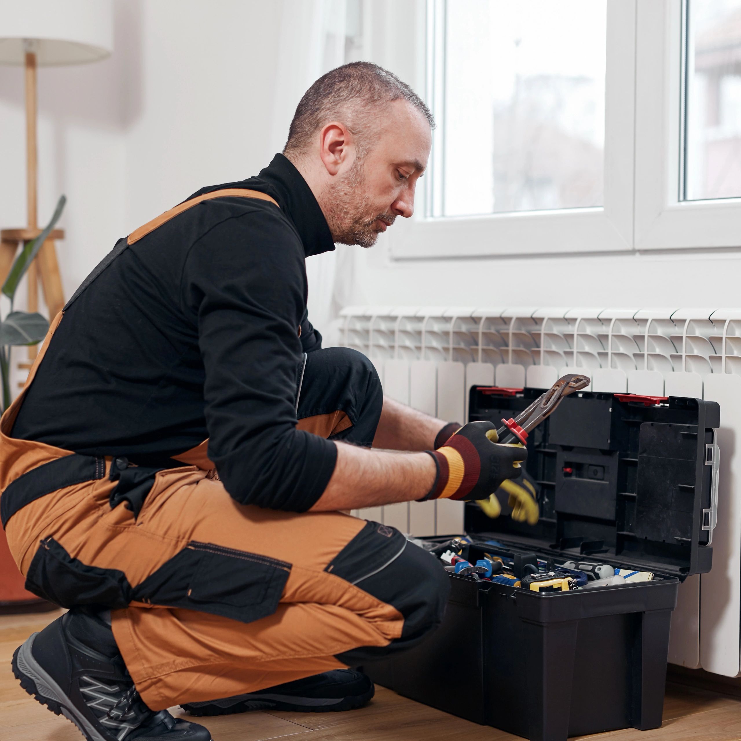 Tradesman plumber with toolbox